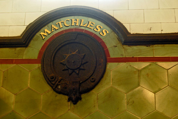 a horse’s name is displayed on the tiles of a stall in the stables at Casa Loma