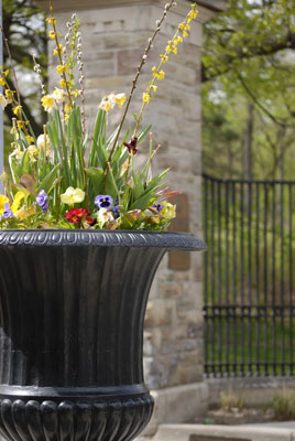 close-up of urn in front of the gate to High Park
