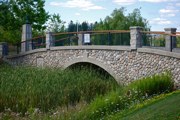 a stone bridge in Richmond Green Park